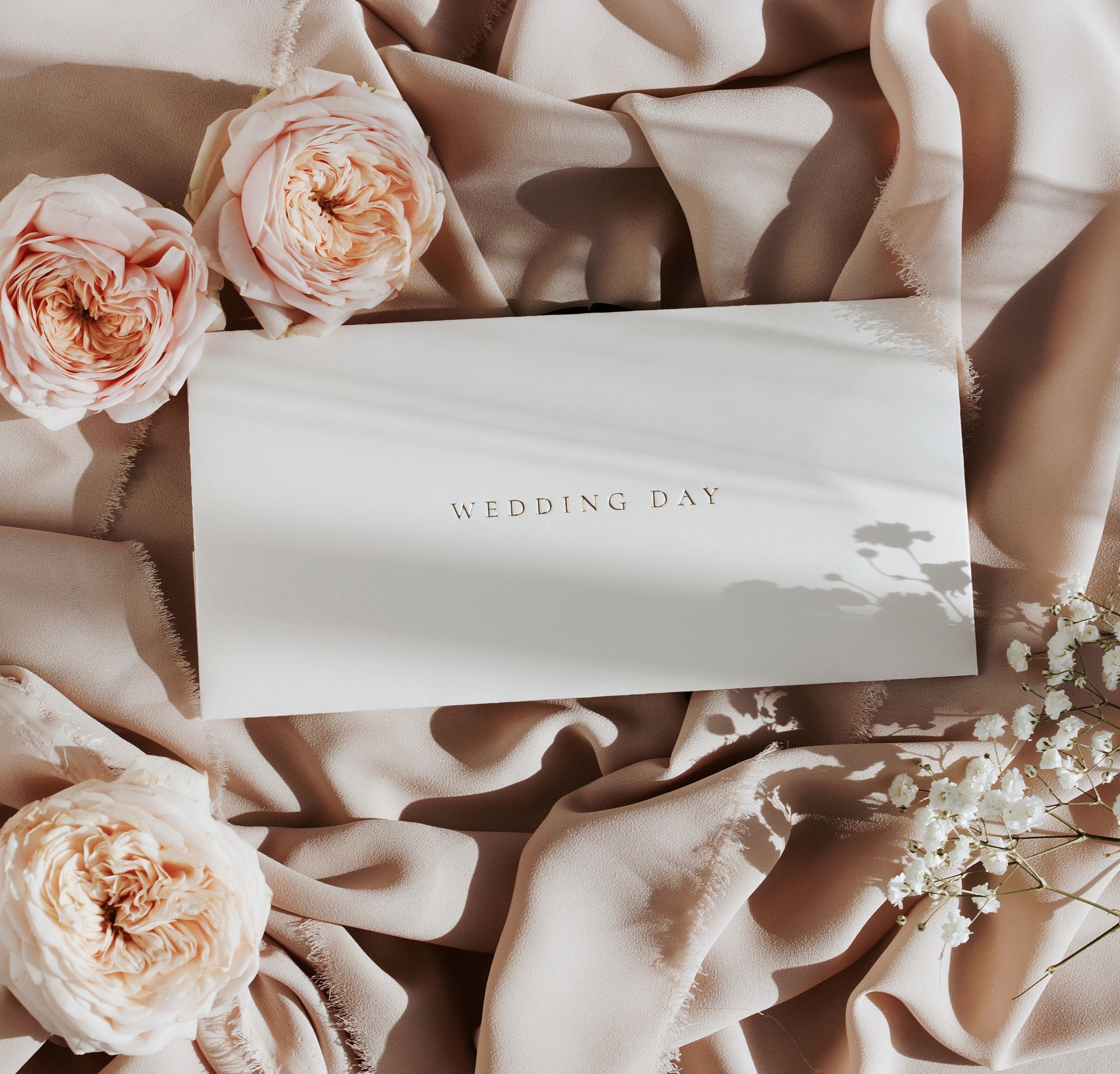elegant wedding invitation flatlay